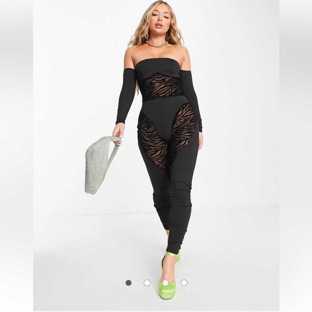 Rebellious Fashion Cutout Mesh Jumpsuit in Zebra Print. New without tags.